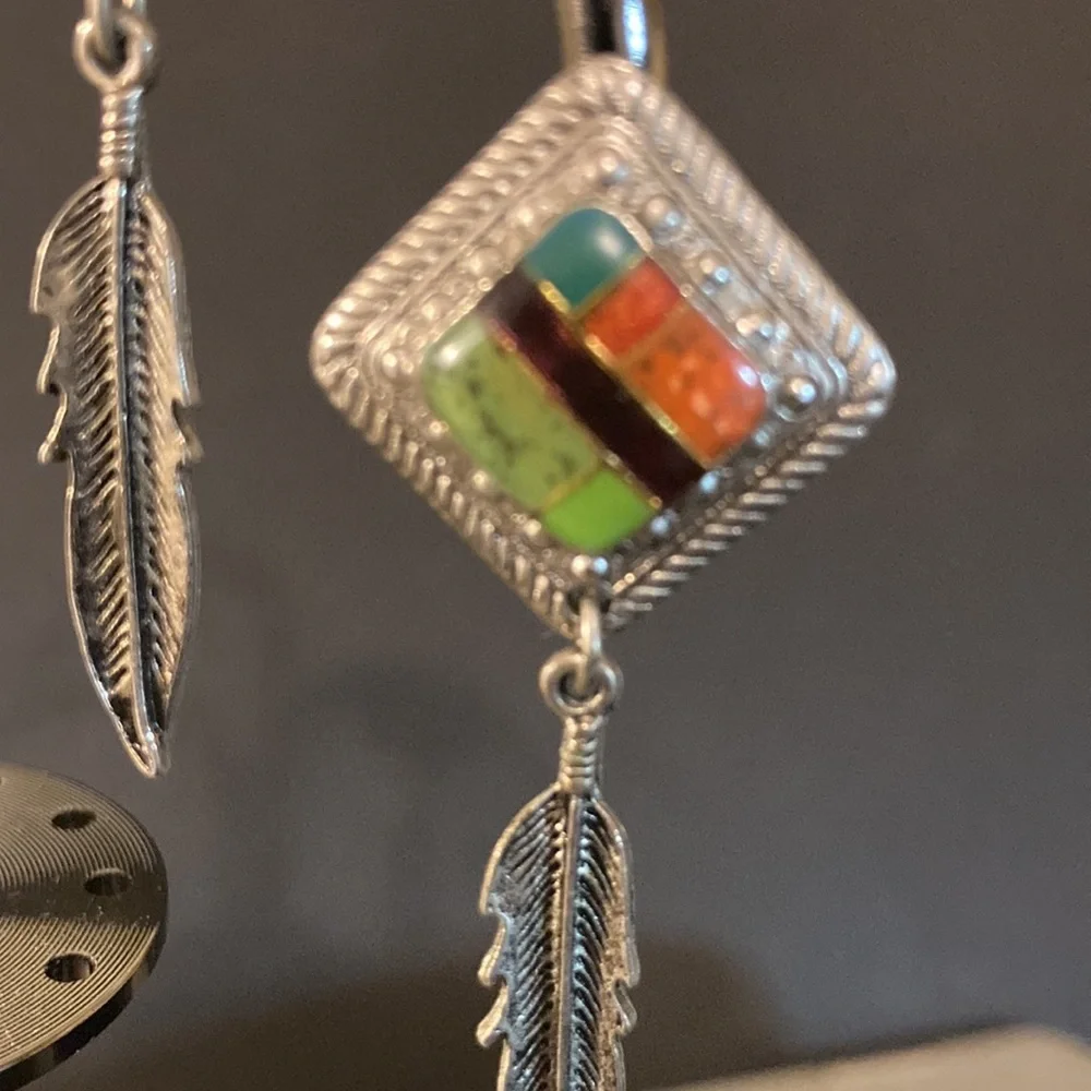 Silver tone and enamel drop feather earrings